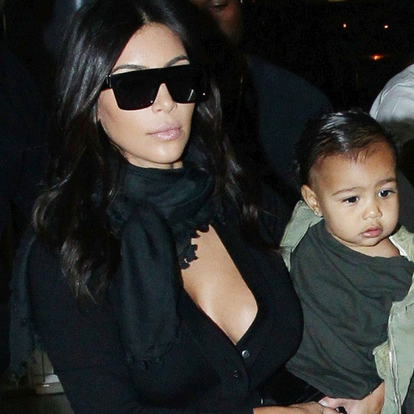 Kardashian poised big sunglasses